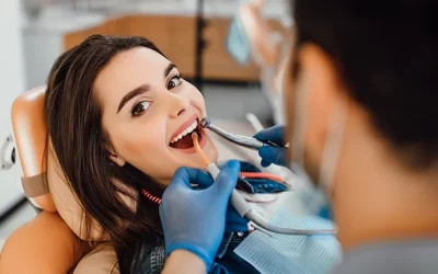 Young Female Patient and Dentist